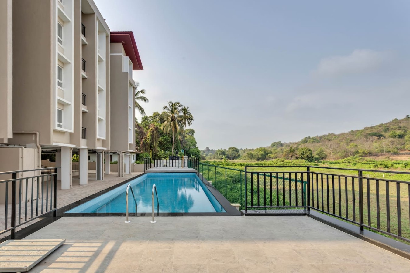 Cozy 2BR Candolim Escape | Pool, Gym & Hill Views - 33