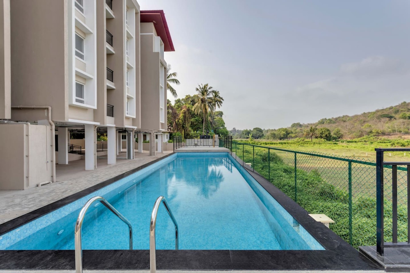 Cozy 2BR Candolim Escape | Pool, Gym & Hill Views - 32