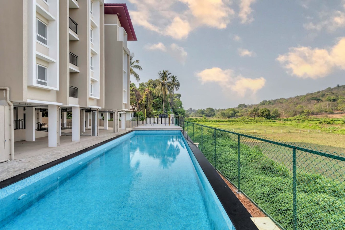 Cozy 2BR Candolim Escape | Pool, Gym & Hill Views - 34