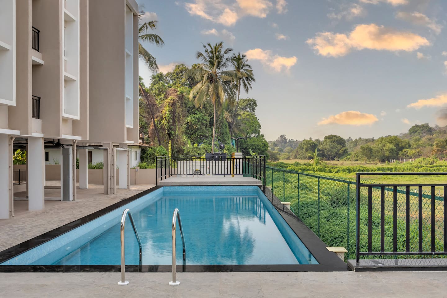 Cozy 2BR Candolim Escape | Pool, Gym & Hill Views - 2